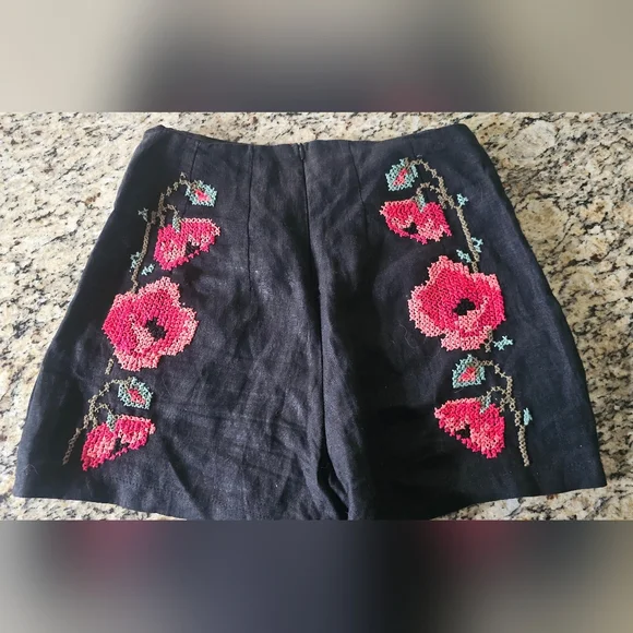 La Troupe black linen-style shorts featuring embroidered pink poppy Flowers - Picture 7 of 7
